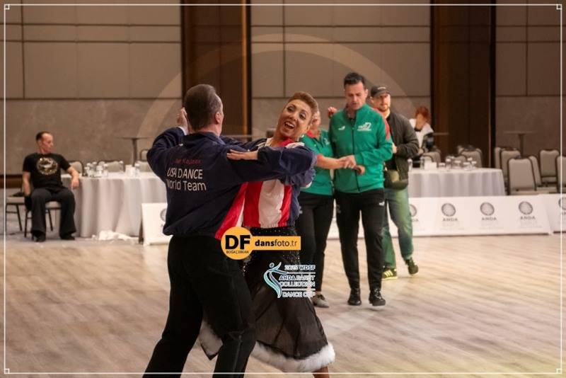 denis kojinov and jeanette chevalier wearing team jackets at world championship